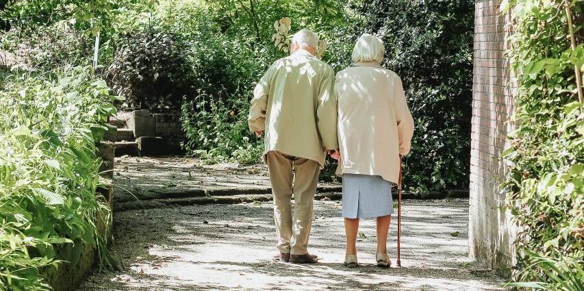 A couple of seniors going for a walk.