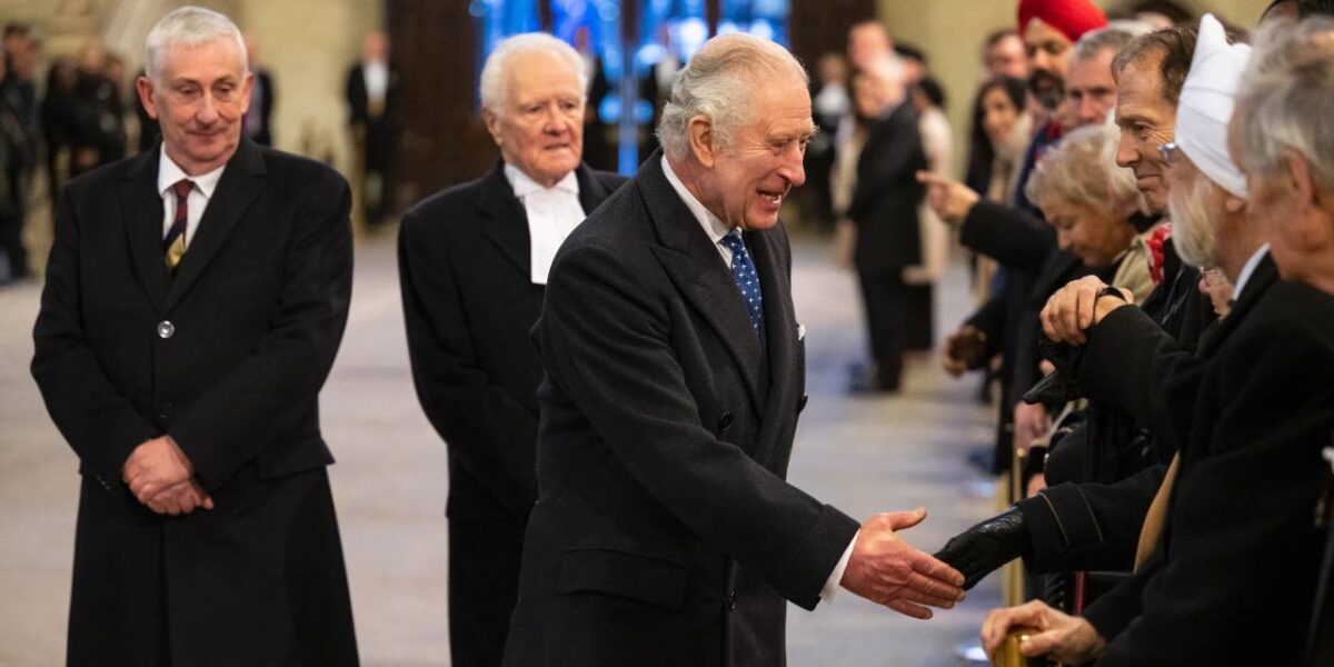 Charles III greeting dignitaries in the House of Lords in December 2022.