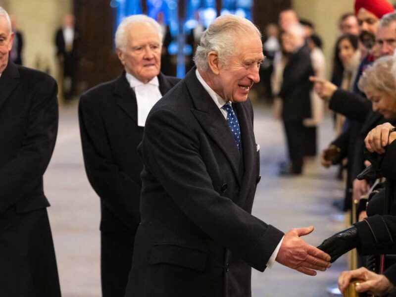 Charles III greeting dignitaries in the House of Lords in December 2022.