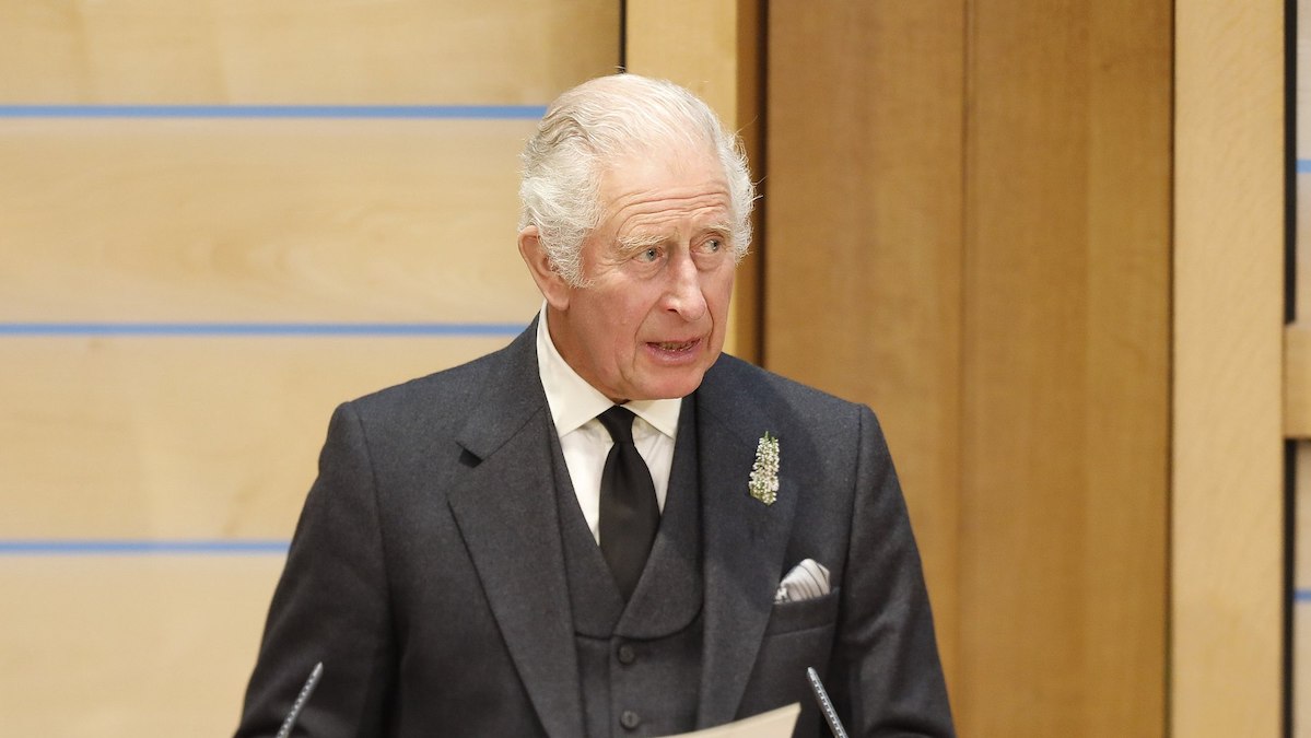 King Charles, on the job at last, looking rather diffident, or perhaps just chilly because he was wearing a kilt, while addressing the Scottish Parliament (Photo: Scottish Parliament).