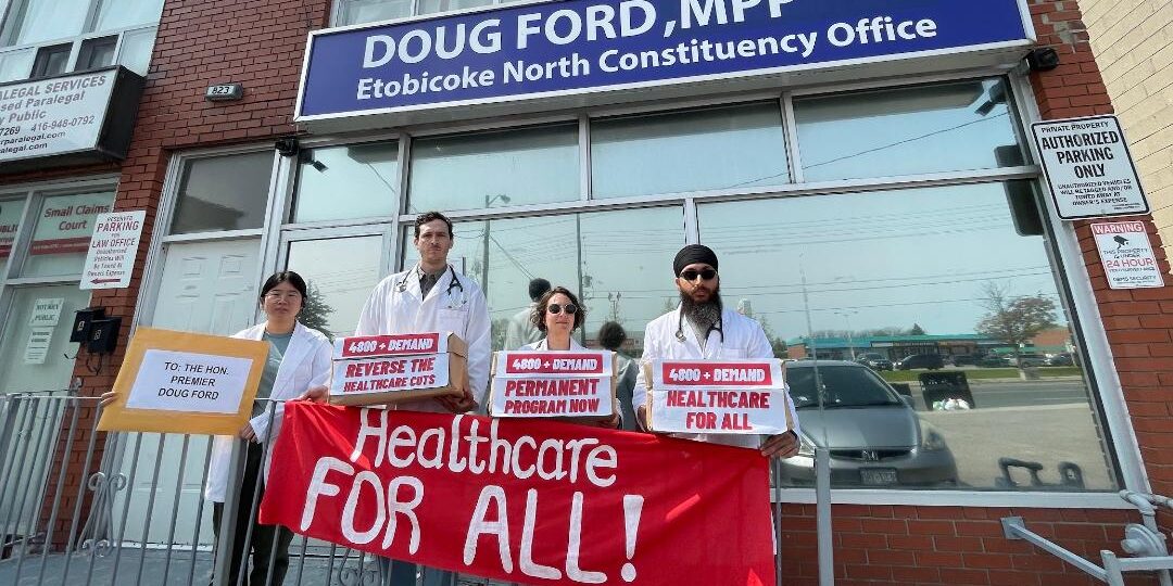 Members of Health for All Now protest the privatization of health care in front of Ontario Premier Doug Ford's office.