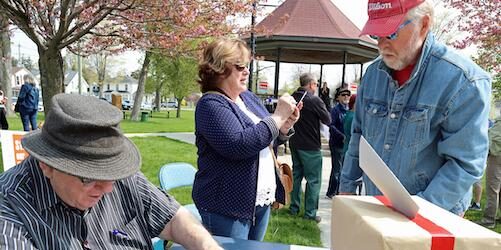 Man voting in OHC citizen referendum.