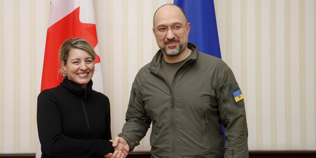 Canada's Global Affairs Minister Melanie Joly shaking hands with Ukrainian Prime Minister Denys Shmyhal.