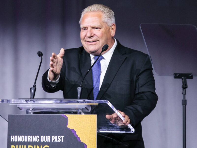 Doug Ford speaking behind a podium at the Vaughn Mayor's gala on June 7, 2023.