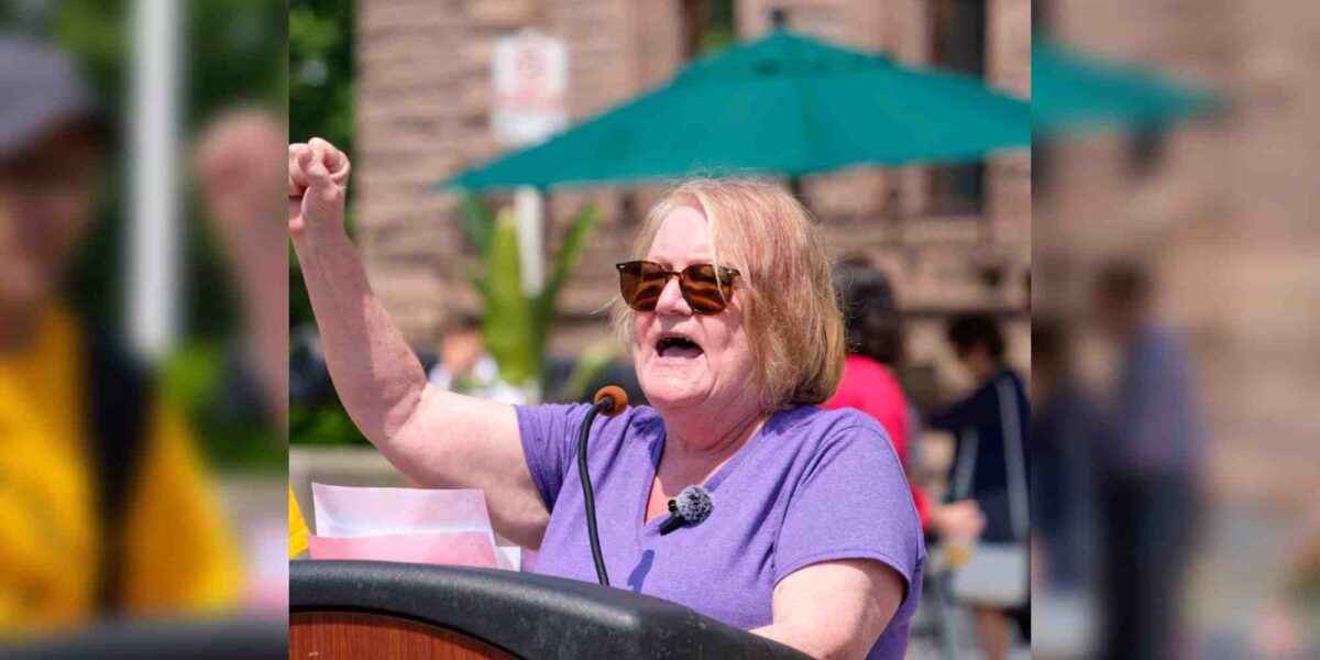 OFL Executive-Vice President Janice Folk-Dawson speaking at a rally.