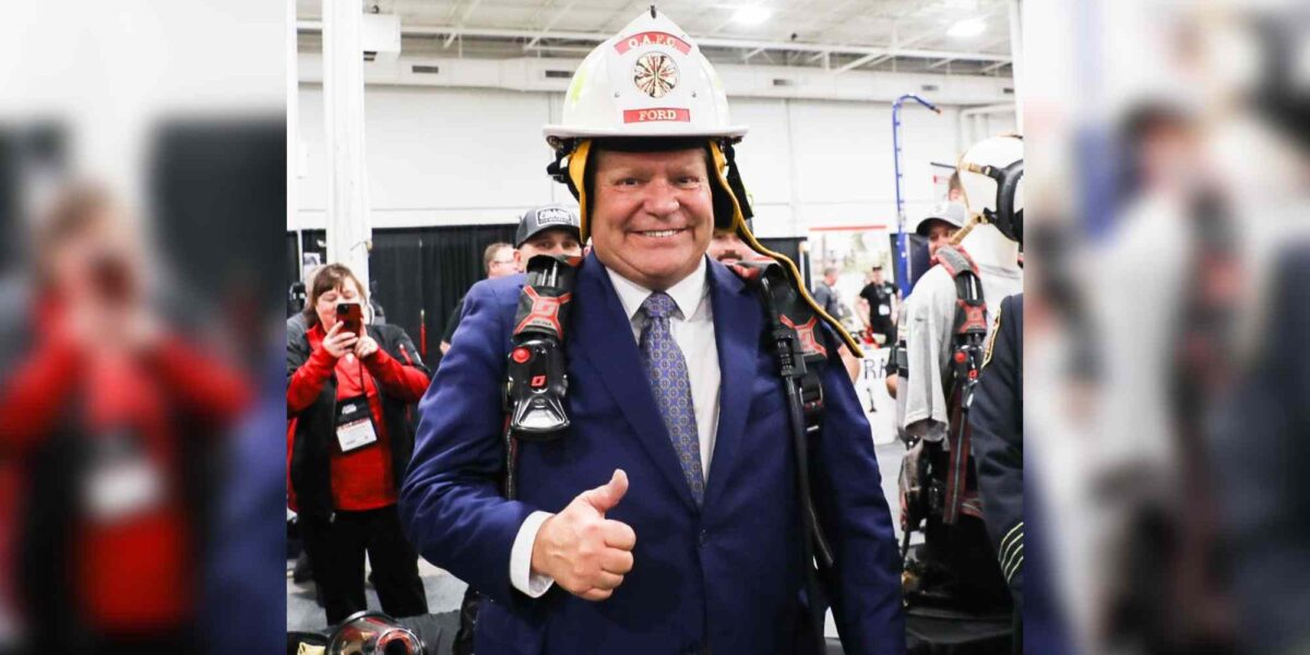 Doug Ford in a fire helmet at the Ontario Fire Chief's conference last month