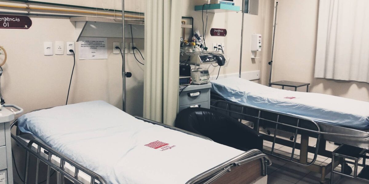 Two empty hospital beds.