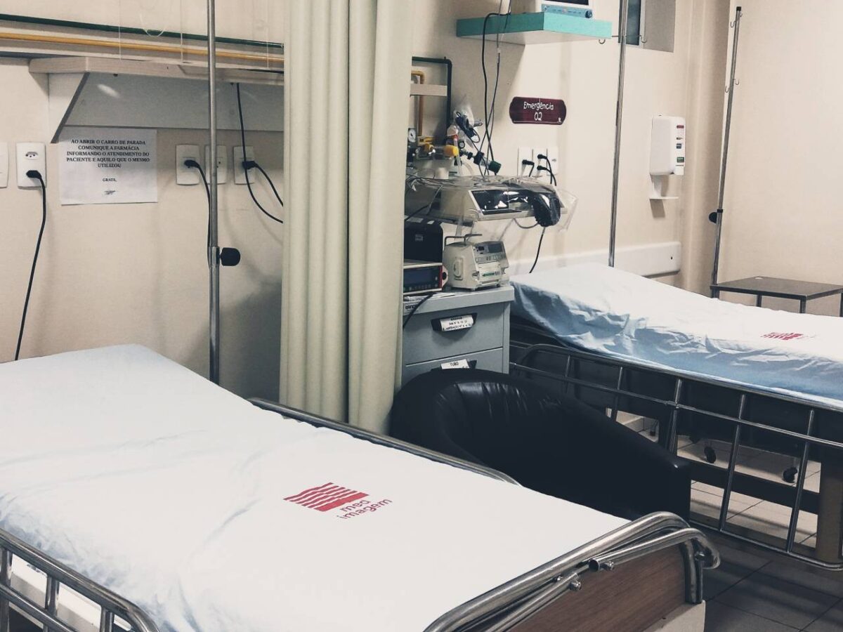 Two empty hospital beds.