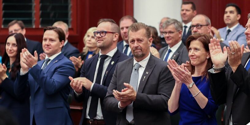 Members of Alberta Legislative Assembly applaud for swearing-in ceremony.