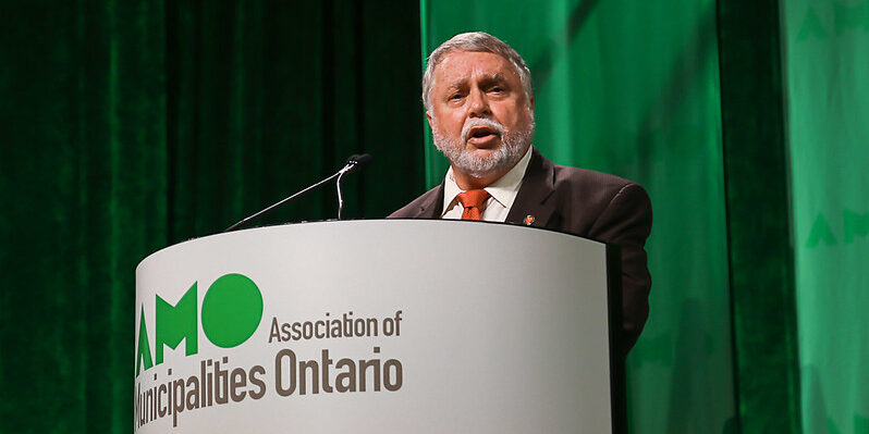 Hamilton city councillor Ted McMeekin speaks at Association of Municipalities of Ontario event in 2015.