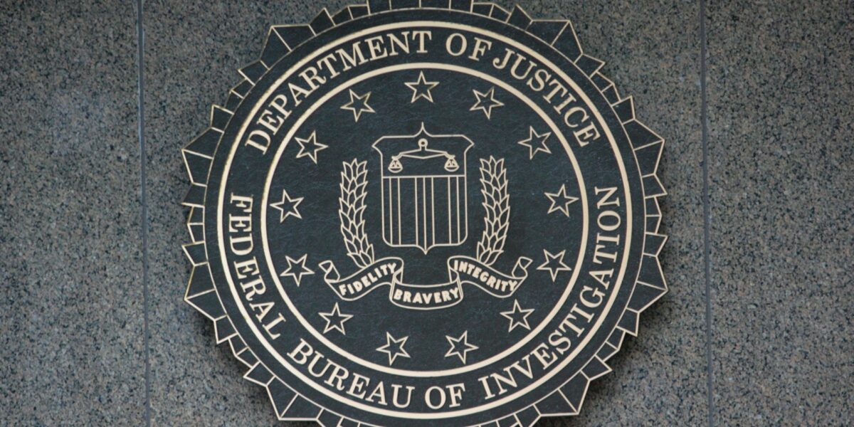 Department of Justice seal on the wall of the FBI building in Washington, D.C.