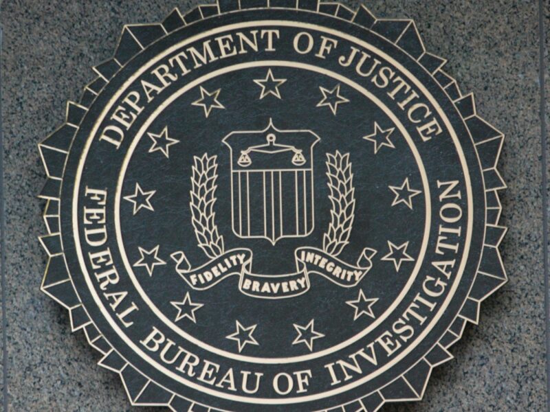 Department of Justice seal on the wall of the FBI building in Washington, D.C.