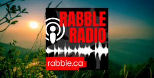 A photo of a scenic view outside behind the rabble radio logo.