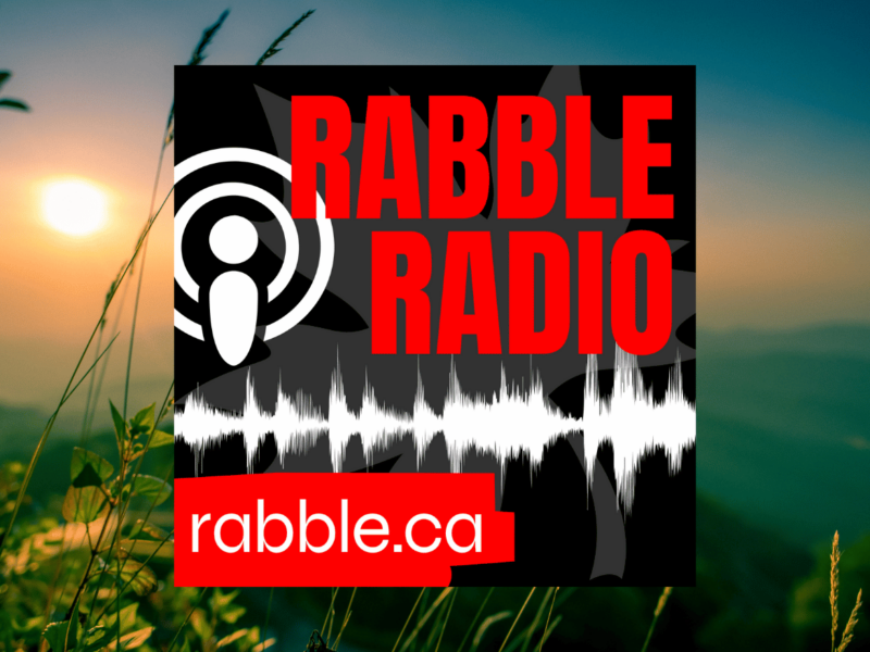 A photo of a scenic view outside behind the rabble radio logo.