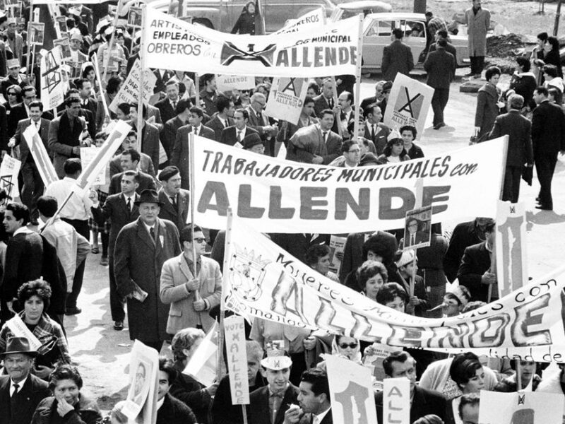 A crowd of people marching to support the election of Salvador Allende for president in Santiago, Chile in 1964.