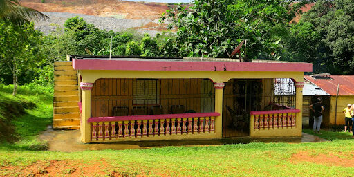 A house in the community of El Naranjo in the Dominican Republic, metres away from the waste facility for the mine set to be expanded.