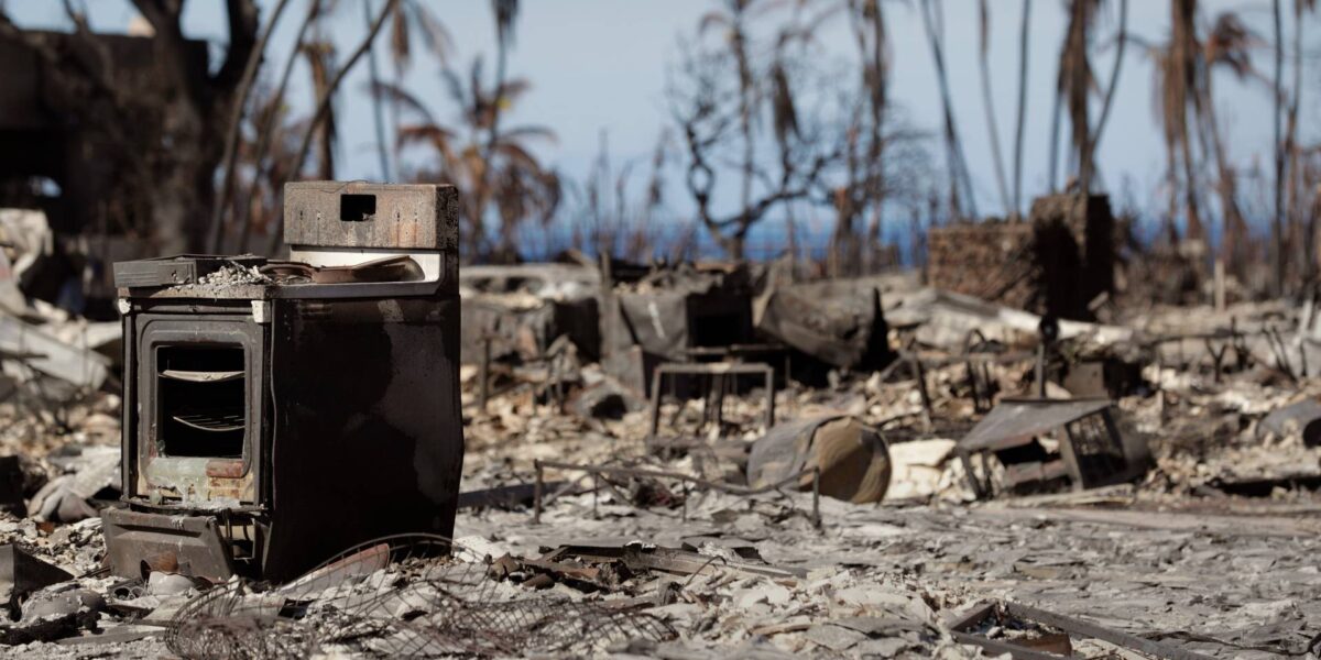 A cook stove stands out on a charred landscape in a neighbourhood destroyed by a wildfire in Lahaina, Hawaii on August 17, 2023.