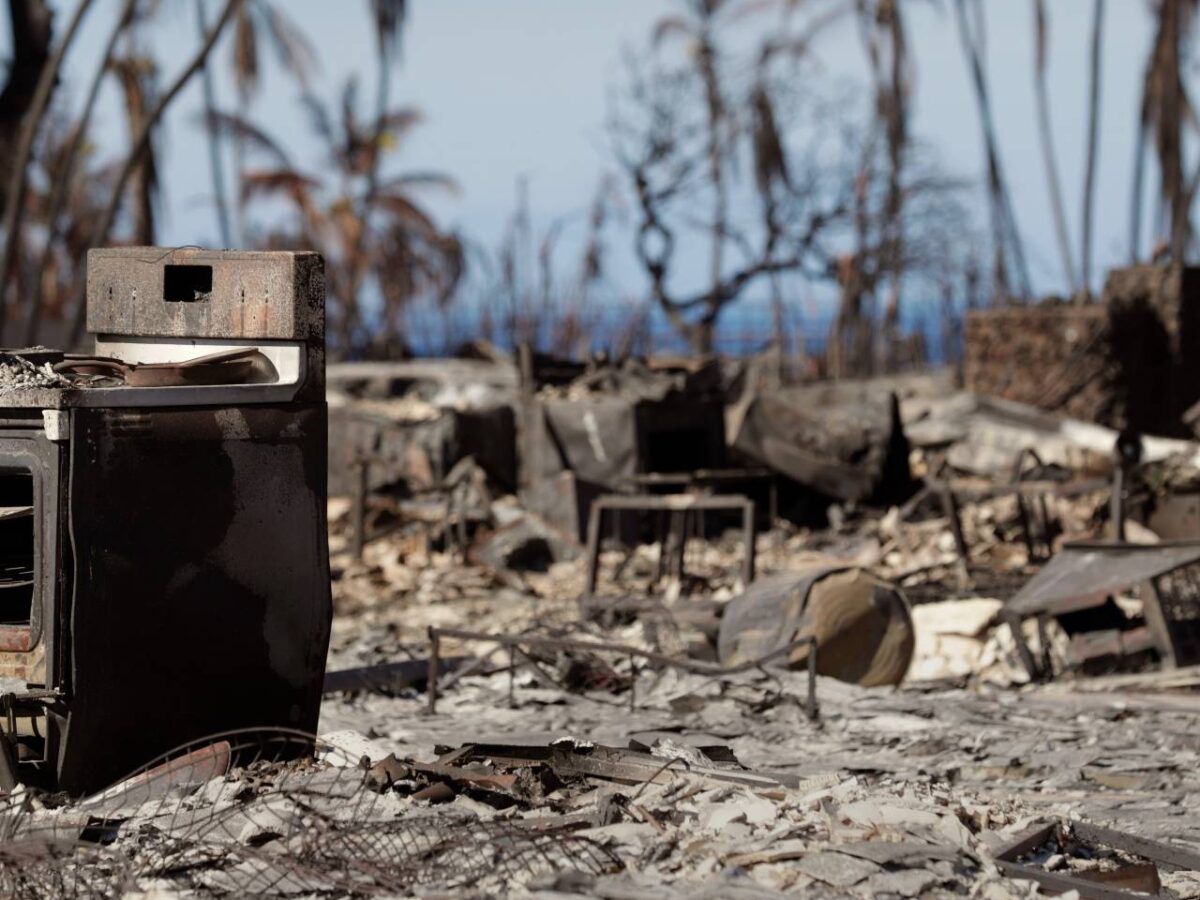 A cook stove stands out on a charred landscape in a neighbourhood destroyed by a wildfire in Lahaina, Hawaii on August 17, 2023.