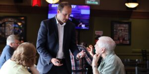 Nate Erskine-Smith speaking with supporters at The Glengarrian Pub in Cornwall, Ontario.