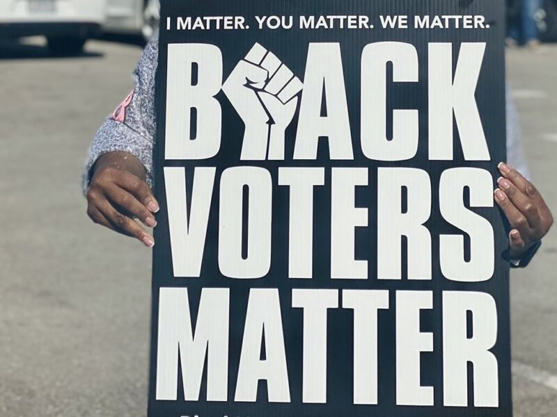 U.S. Congresswoman Terri Sewell holding Black Voters Matter sign on Election Day 2020.