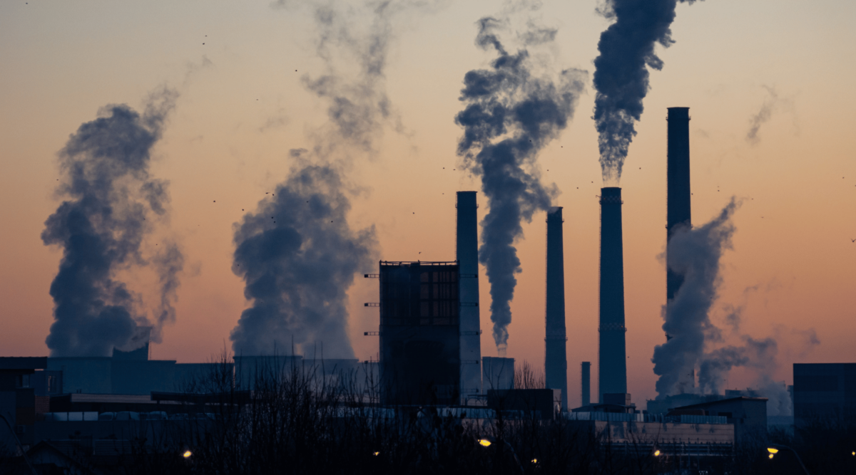 A skyline image of air pollution and a sunset.