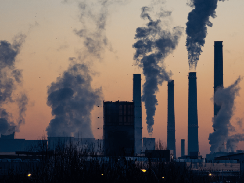 A skyline image of air pollution and a sunset.