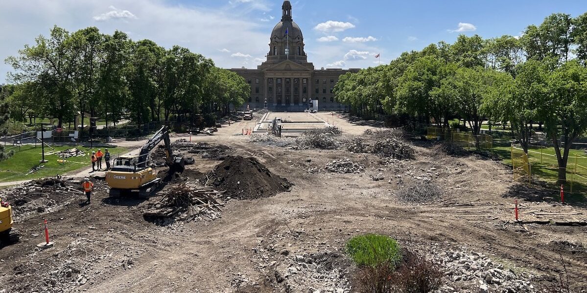 The grounds of the Alberta Legislature in summer under construction.