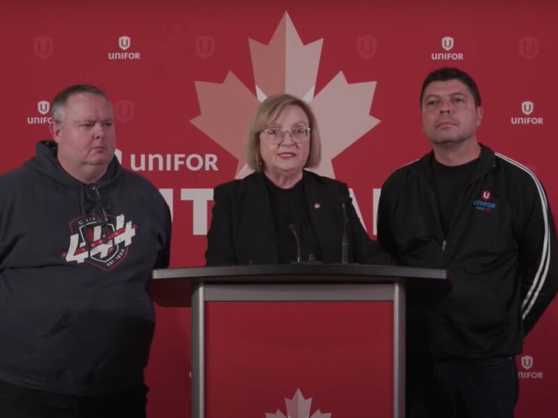 Pictured centre is Unifor president Lana Payne as she gives an update on the deal her union reached with Stellantis on Monday, October 30. She is accompanied by James Stewart, Stellantis master bargaining committee chair (right) and Vito Beato, Stellantis master bargaining committee vice-chair (left).