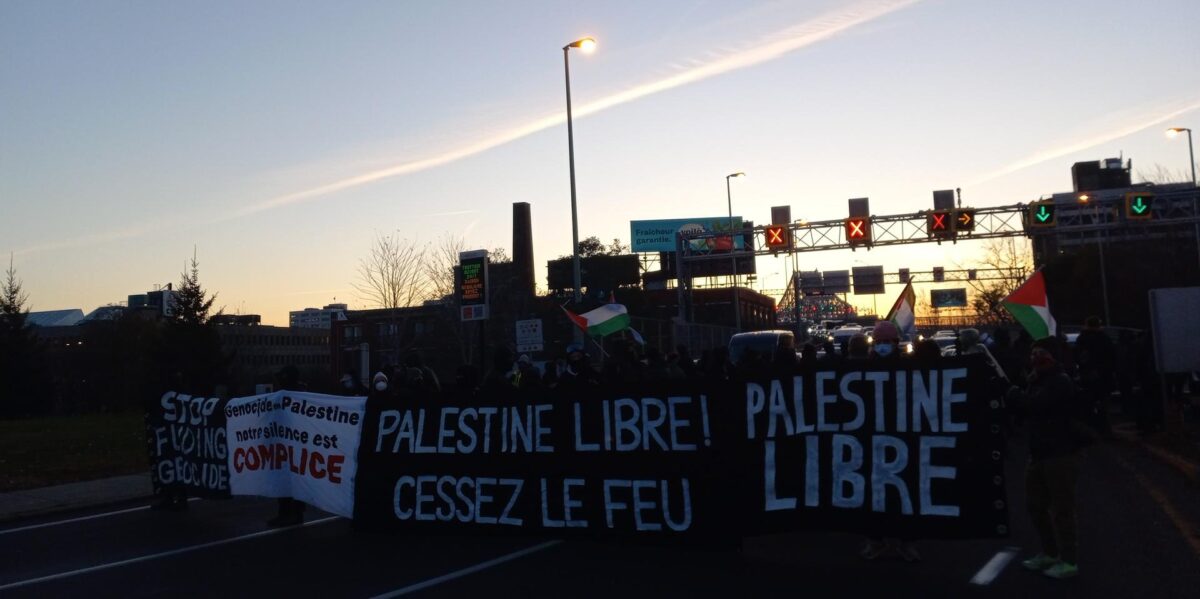 Canadians protesting the bombing of Gaza by blocking the Jacques Cartier bridge in Montreal in during the dawn hours of November 16, 2023.