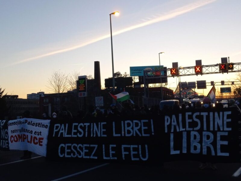 Canadians protesting the bombing of Gaza by blocking the Jacques Cartier bridge in Montreal in during the dawn hours of November 16, 2023.