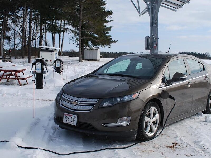 An electric vehicle at a charging station.