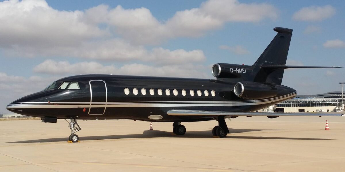 A photo of a black private jet.