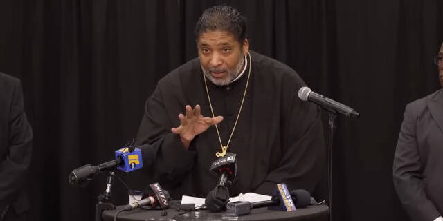 Bishop William Barber at a press conference.