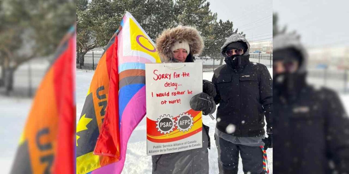 Striking union workers on the picket line in Kingston, Ontario.