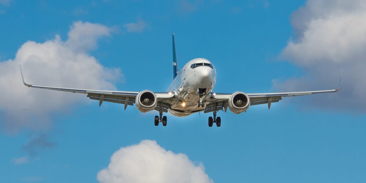 A Boeing 737 aircraft in mid-flight.