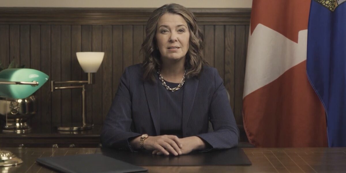 Alberta Premier Danielle Smith giving a televised address.