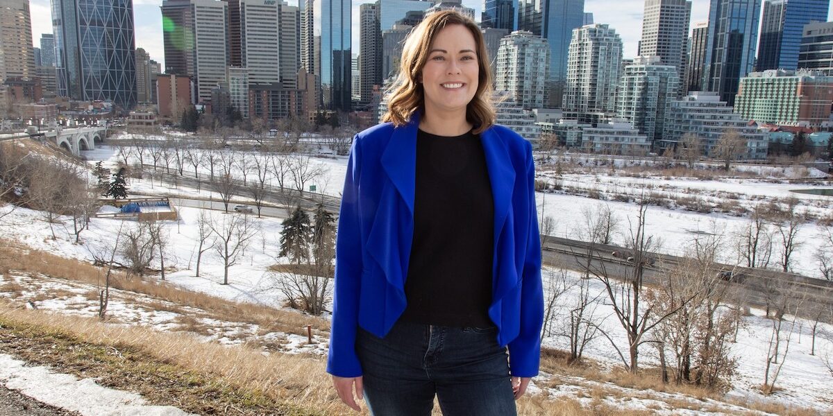 NDP leadership candidate Kathleen Ganley with Calgary’s skyline in the background.