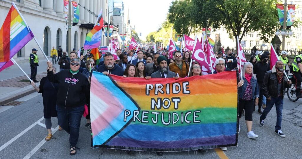 CUPE leaders stand in support of trans youth.