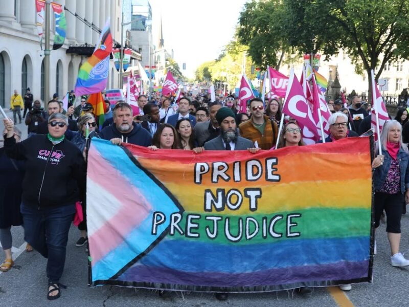 CUPE leaders stand in support of trans youth.