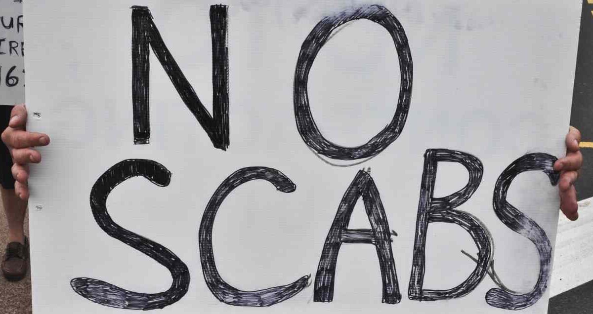 A sign reading "no scabs."