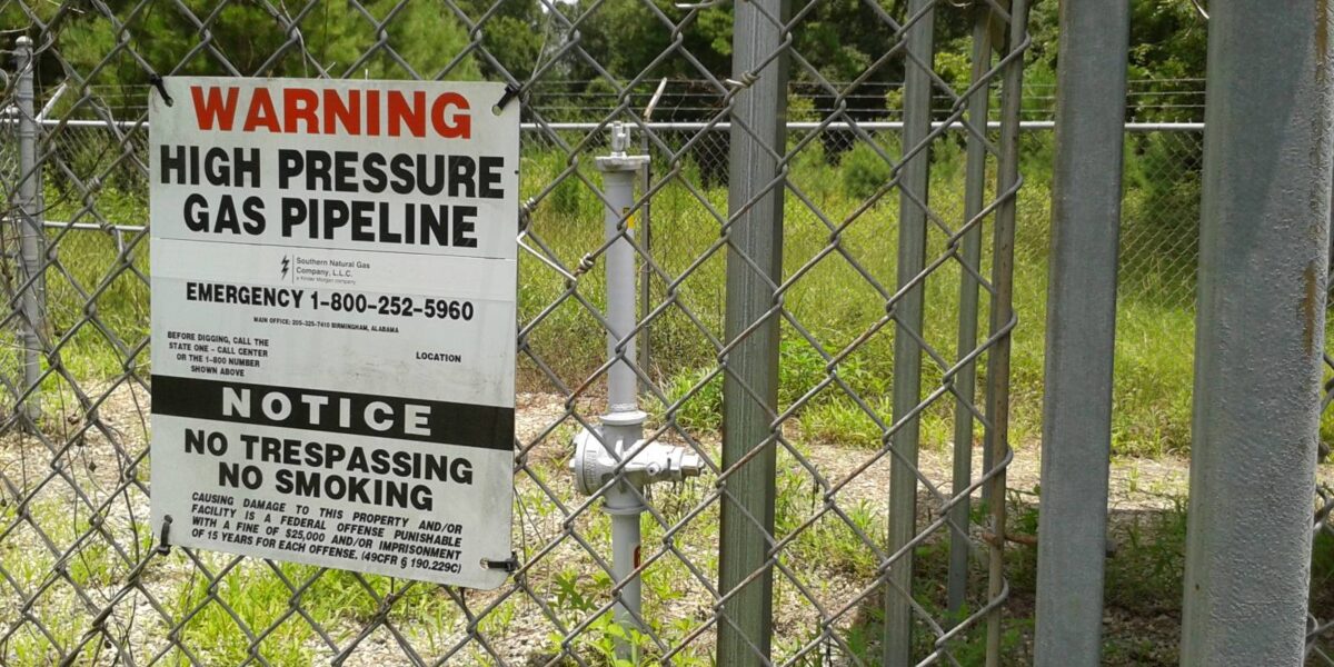 A warning sign for a natural gas pipeline.