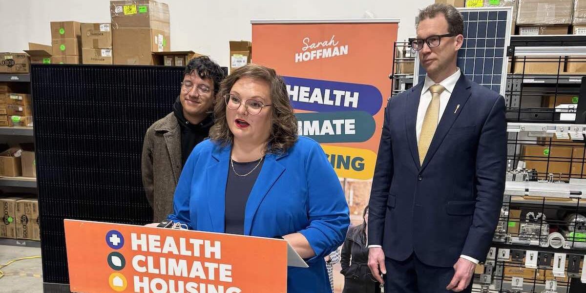 NDP leadership candidate Sarah Hoffman sets out her climate policy at an Edmonton solar equipment supply company yesterday, with her are climate organizer Juan Vargas Alba and Edmonton MLA Marlin Schmidt, her campaign chair.