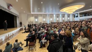 Naheed Nenshi, alone on an unadorned stage, addresses his audience last night in the first Edmonton stop of his campaign to lead the Alberta NDP.