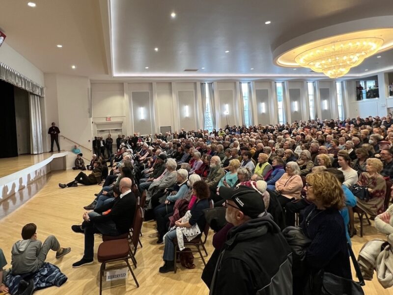 Naheed Nenshi, alone on an unadorned stage, addresses his audience last night in the first Edmonton stop of his campaign to lead the Alberta NDP.