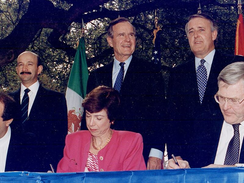 U.S. President George Bush, Prime Minister Brian Mulroney and Mexican President Carlos Salinas participate in the initialling ceremony of the North American Free Trade Agreement in 1992.