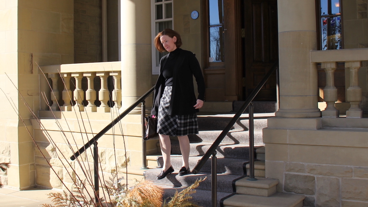 Premier Alison Redford marches grimly to her limo from Government House in Edmonton on March 13, 2014, after being handed a “work plan” by the Progressive Conservative Caucus – it didn’t work, and a week later she resigned.