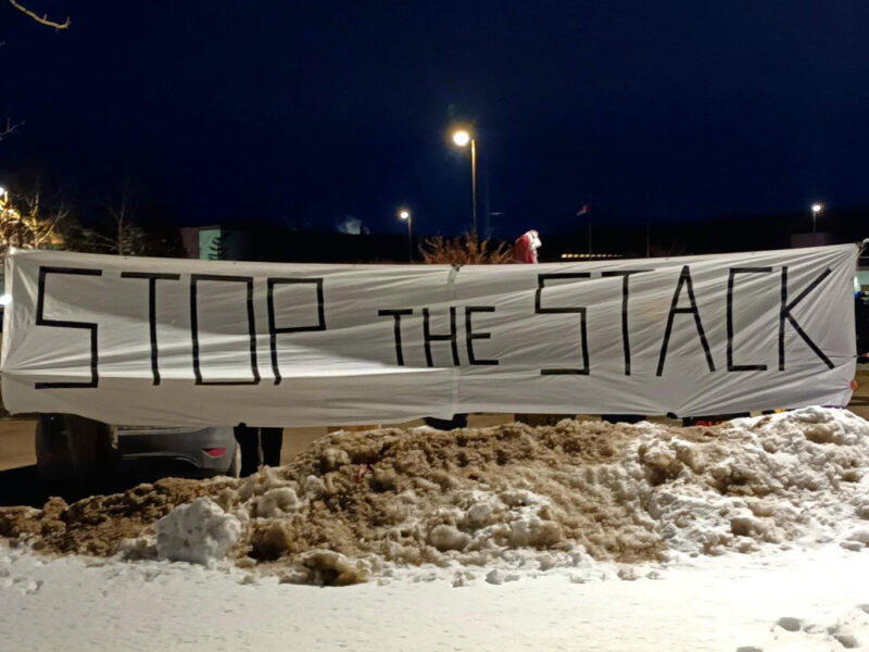 A banner reading Stop the Stack.