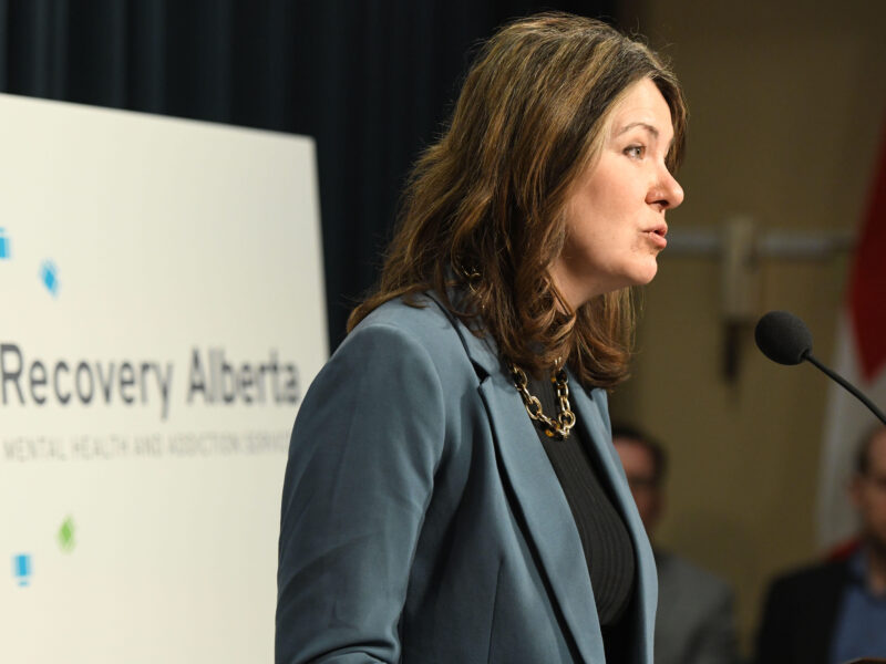 Premier Danielle SMith at a press conference announcing new mental health organizations.