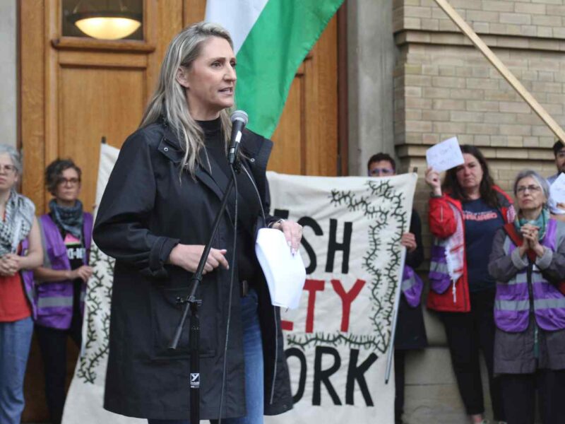 OFL president Laura Walton speaks at a rally in support of UofT students on Monday, May 27.