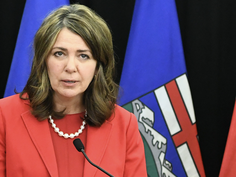 Alberta Premier Danielle Smith speaking at a press conference.